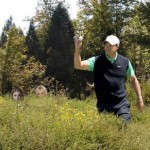 Woods gets warm welcome back from behind those bushes